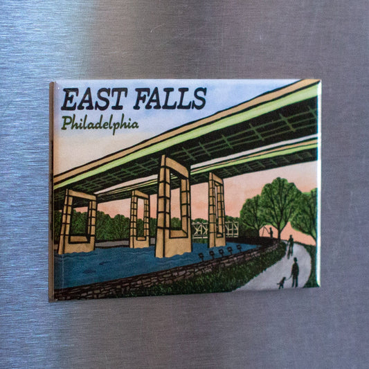 Fridge magnet with 'East Falls Twin Bridges Philadelphia' design on a metallic surface