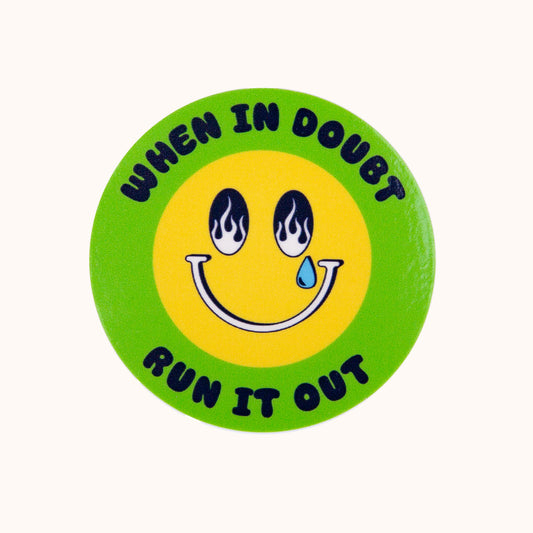 Circular sticker with smiley face and text 'When in doubt, run it out' on a green border.