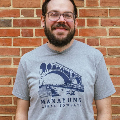 Illustration of the Manayunk towpath in Philadelphia screen printed in blue on a Grey T shirt
