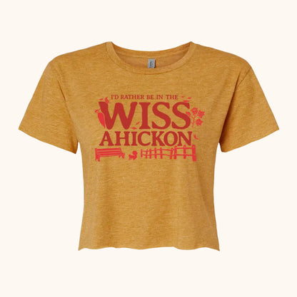 Yellow crop with 'I'd rather be in the Wissahickon' text and nature graphics on a beige background